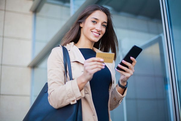 woman holding credit card